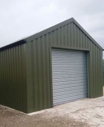 Steel cladding in place on agricultural storage building