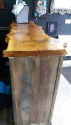 Countertop made from Burred slab Oak with live edges and finished with Danish oil.